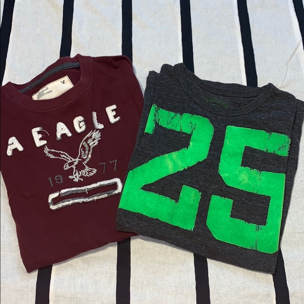 2 xs american eagle shirts.